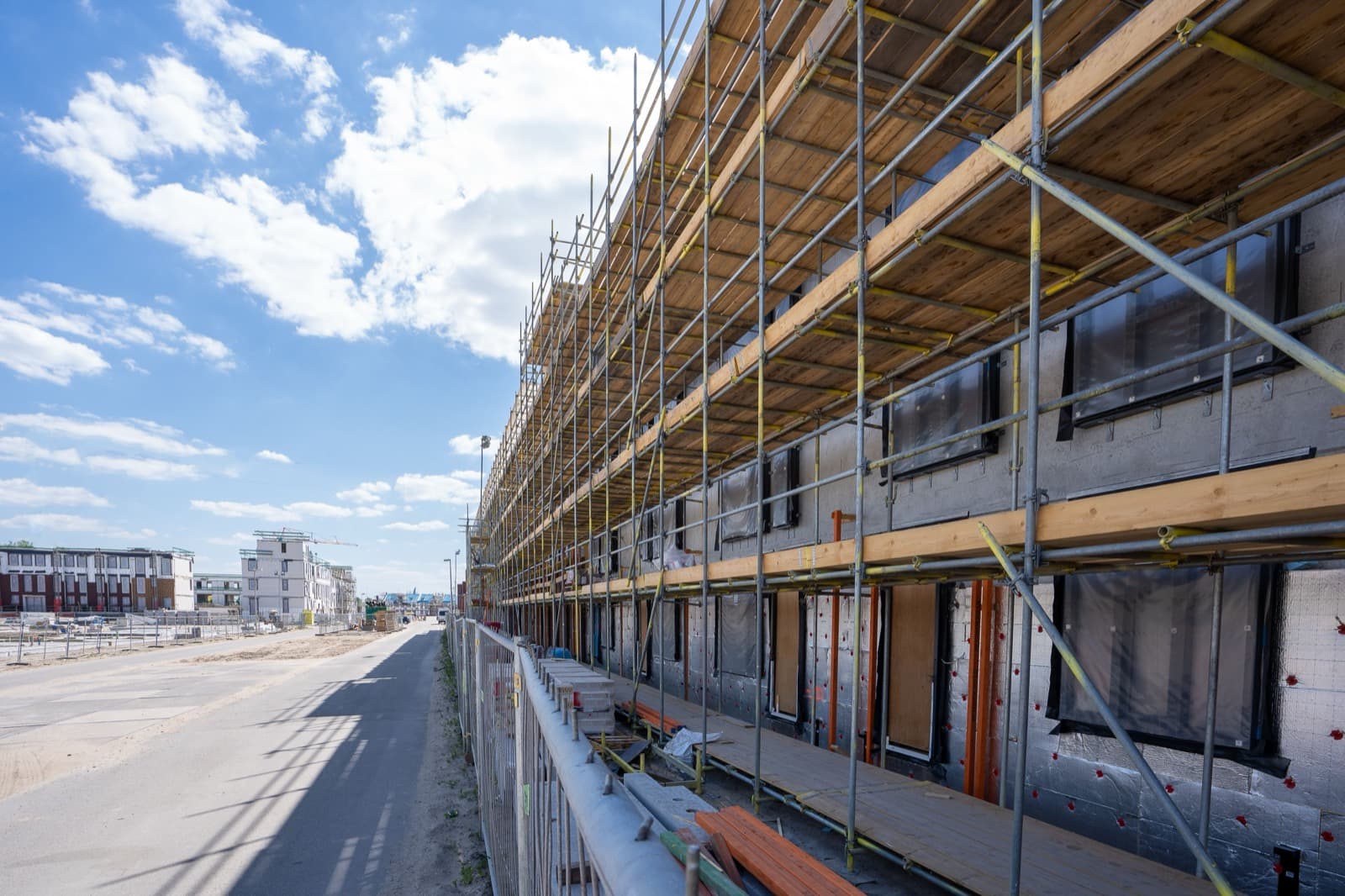 SuperConstruct ground-up commercial construction case study - lender approval and field reporting